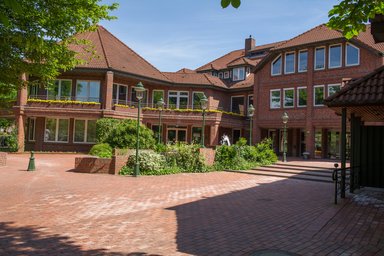 Brick town hall ensemble and small town hall square