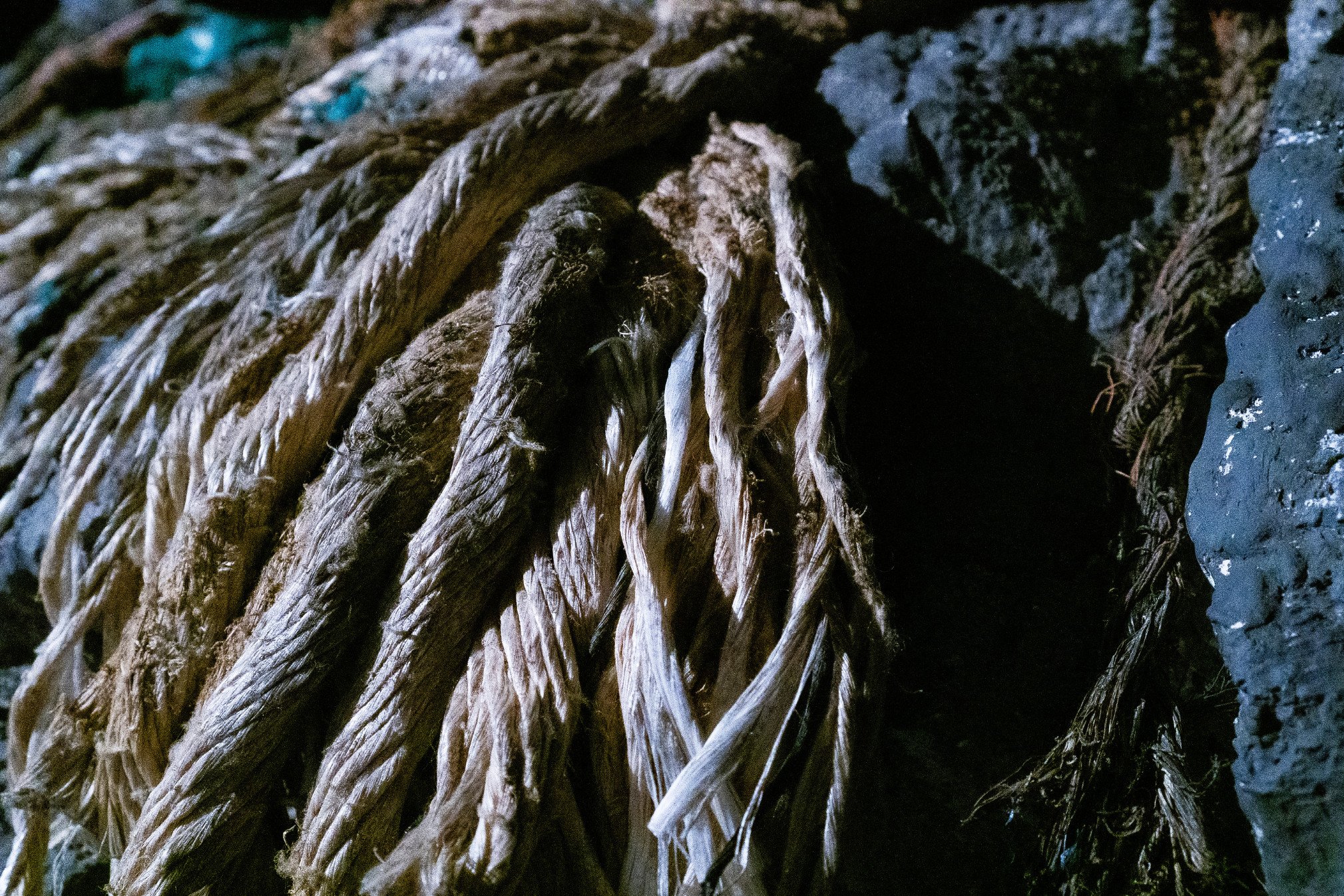 2025-06-25 Thinking through Materialities Photo of thick ropes on a stone