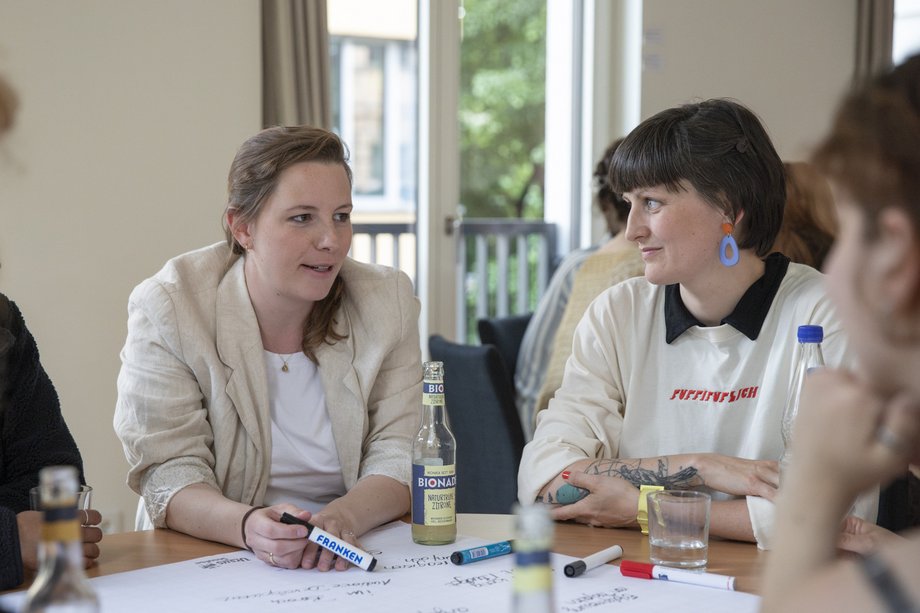 Two students in an informal dinner conversation