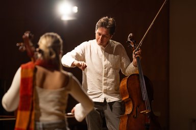 Alexey Stadler two people with cellos