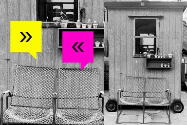 2 chairs in front of a caravan
