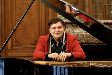 Hubert Rutkowski Portrait of a man at an open piano