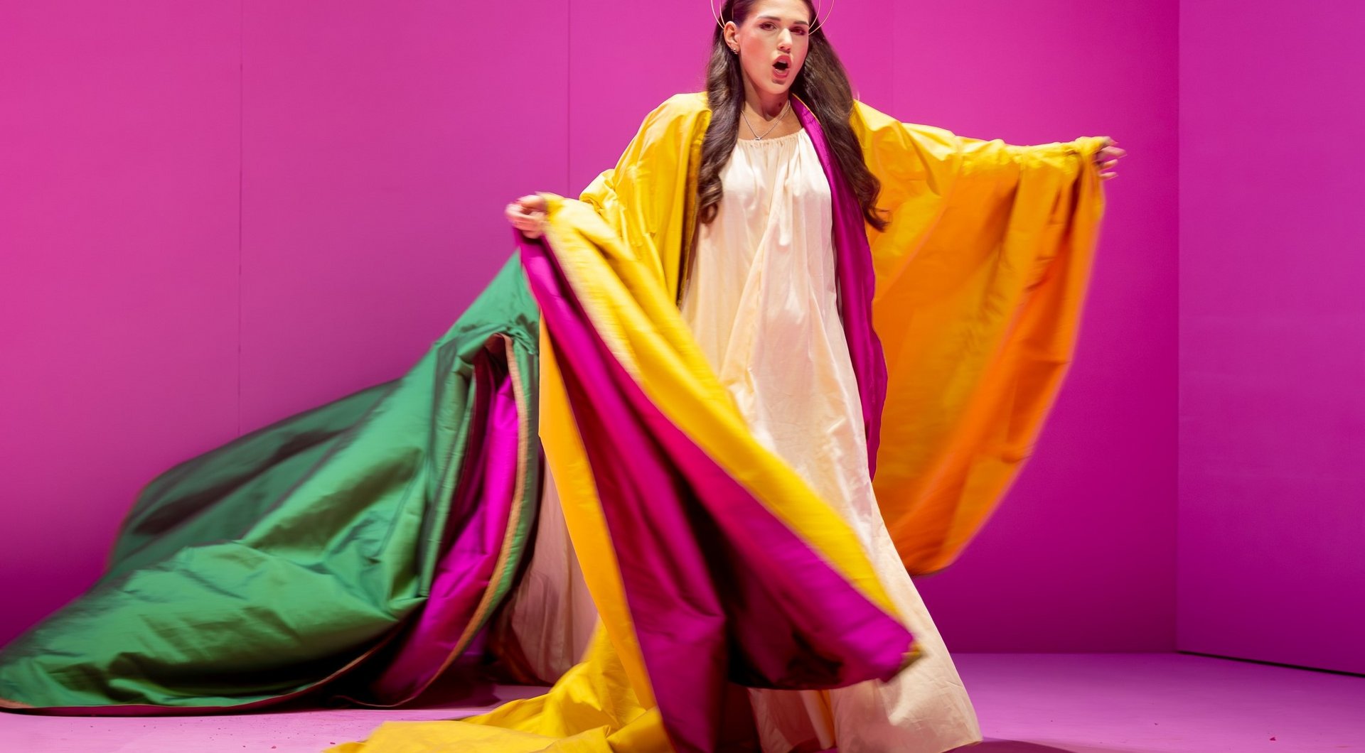 Woman with halo in colorful clerical garb