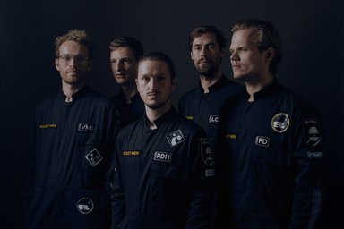 ROCKET MEN Group photo of five men