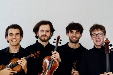 ETNA Quartet the four musicians with their string instruments